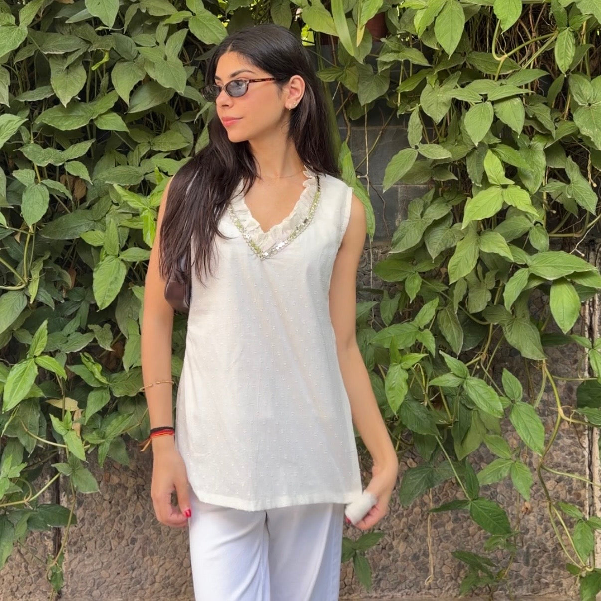 White sleeveless frill kurti