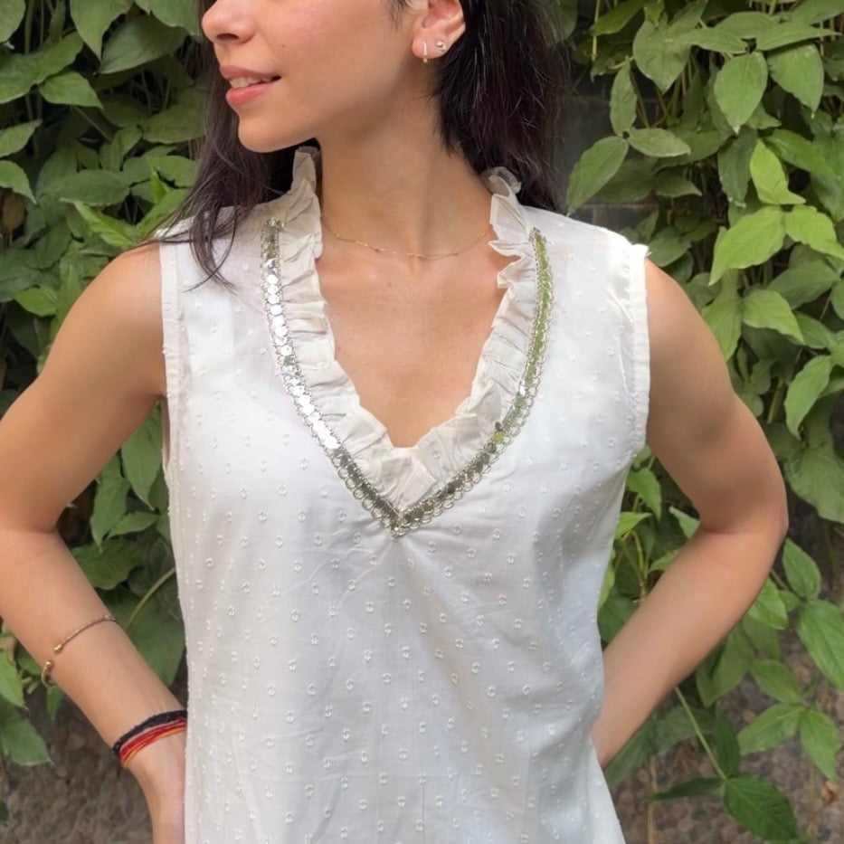 White sleeveless frill kurti